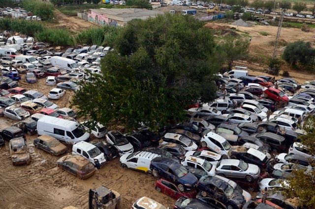 <p>Soldiers search wrecked cars damaged by flooding in Massassana region of Valencia in eastern Spain</p>