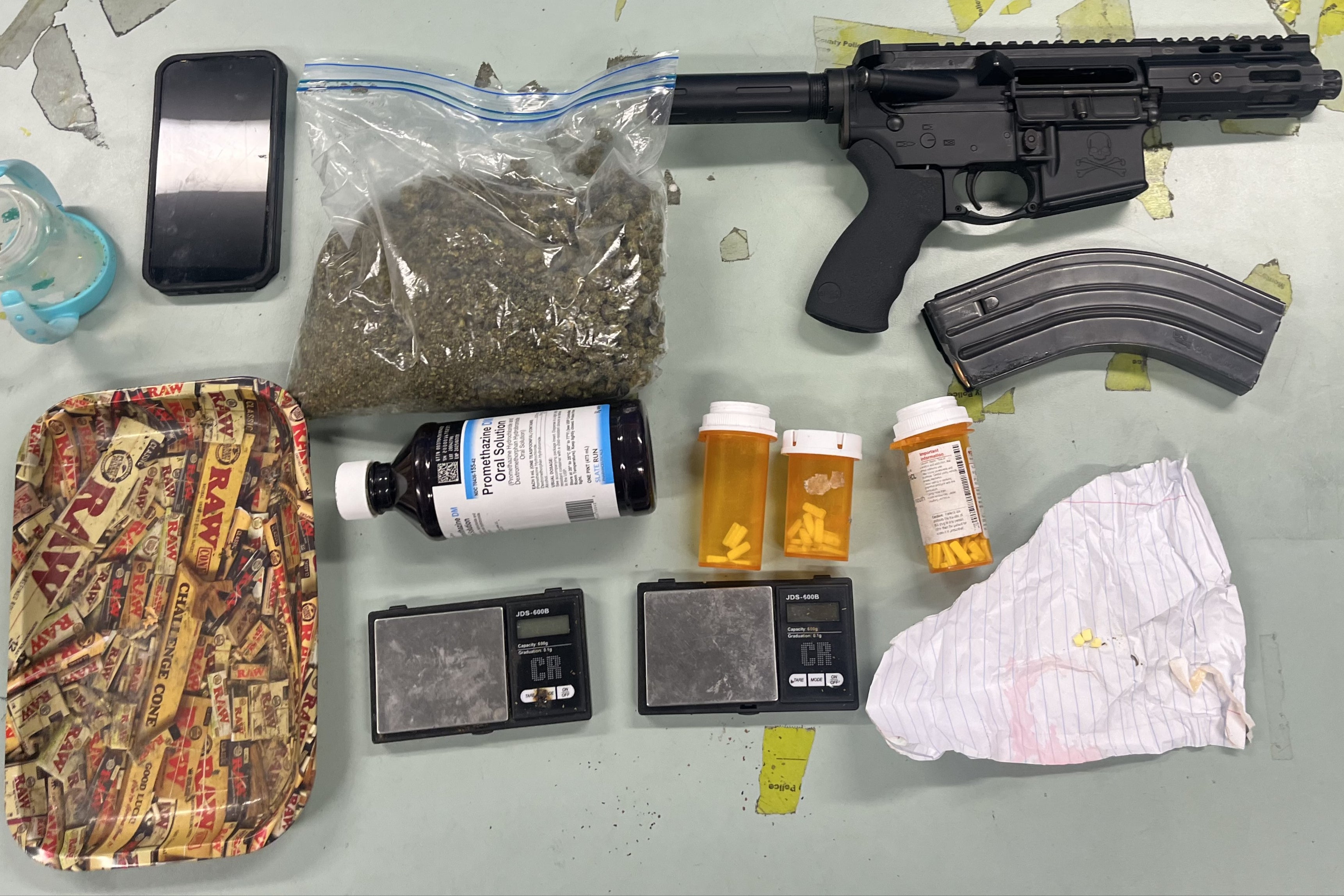 Drugs and a weapon confiscated by the Montgomery County Department of Police in Maryland