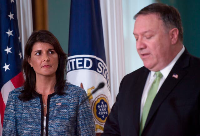 <p>US Secretary of State Mike Pompeo speaks as US Ambassador to the United Nation Nikki Haley looks on at the US Department of State in Washington DC on June 19, 2018. Trump announced on Friday evening that he would not be inviting either of them to serve in his administration  this time around </p>