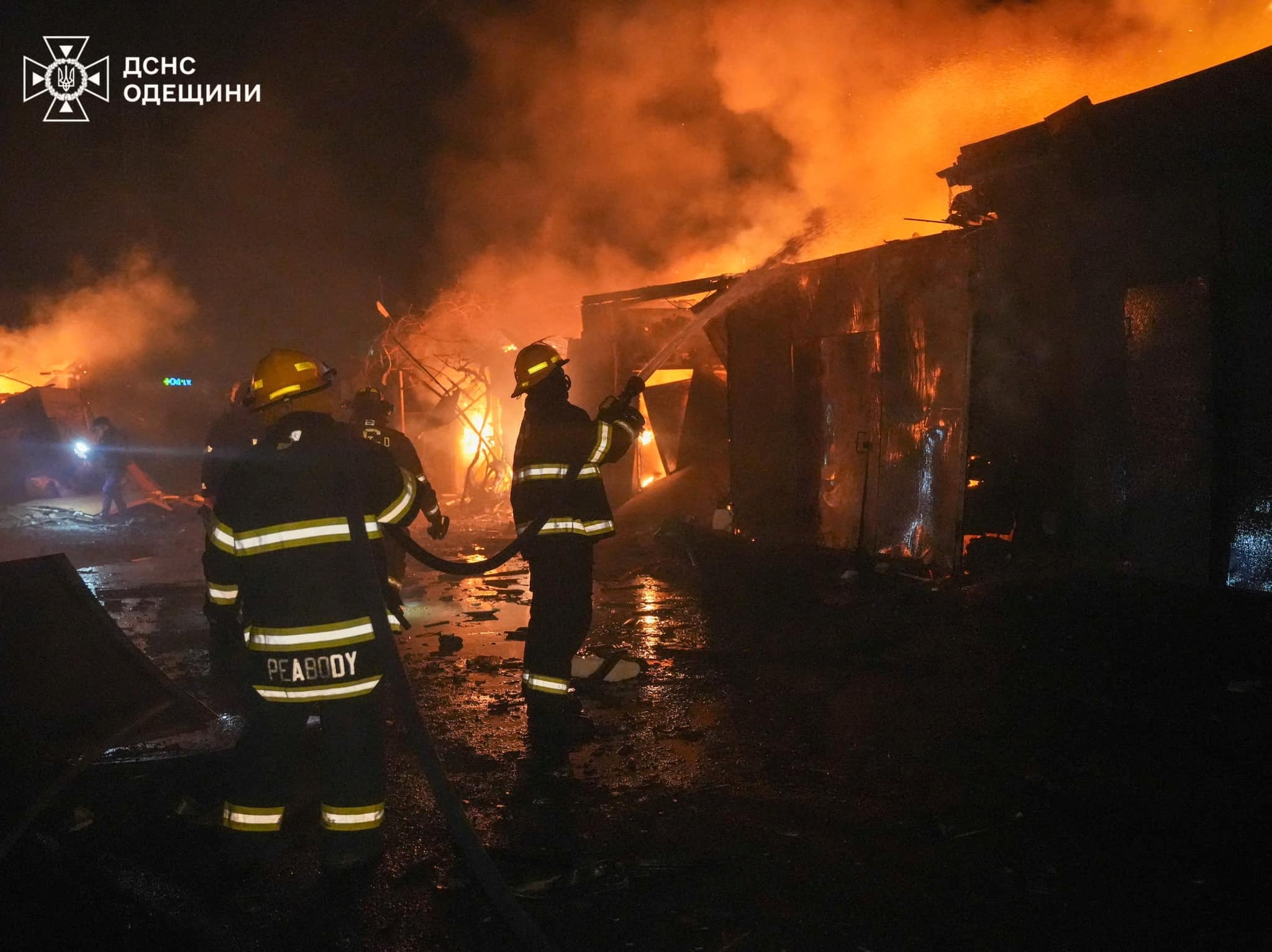 Rescuers work at a site of a Russian drone strike, amid Russia's attack on Ukraine, in Odesa, Ukraine