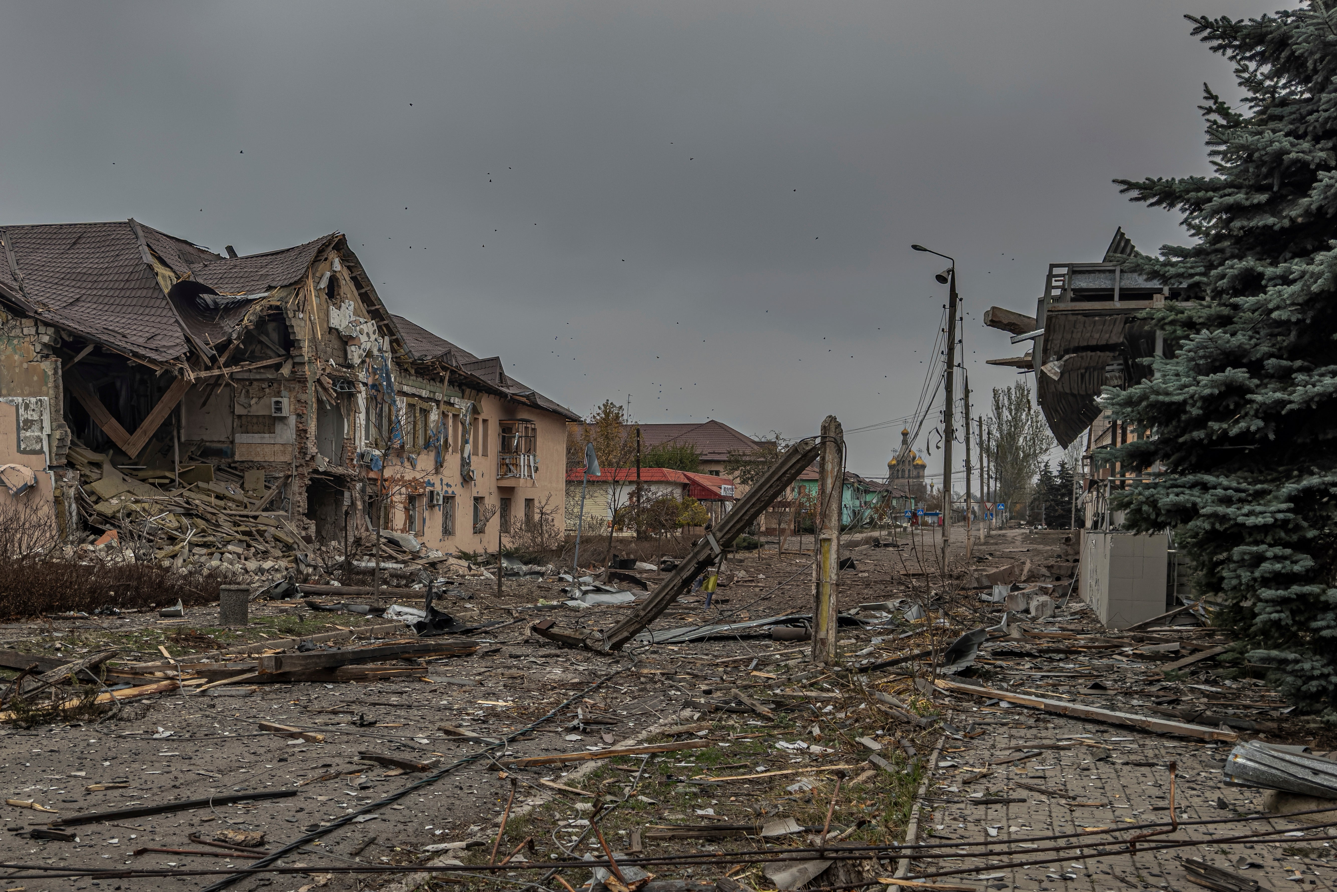 A central streets covered in debris from destroyed residential buildings after Russian bombing in Kurakhove