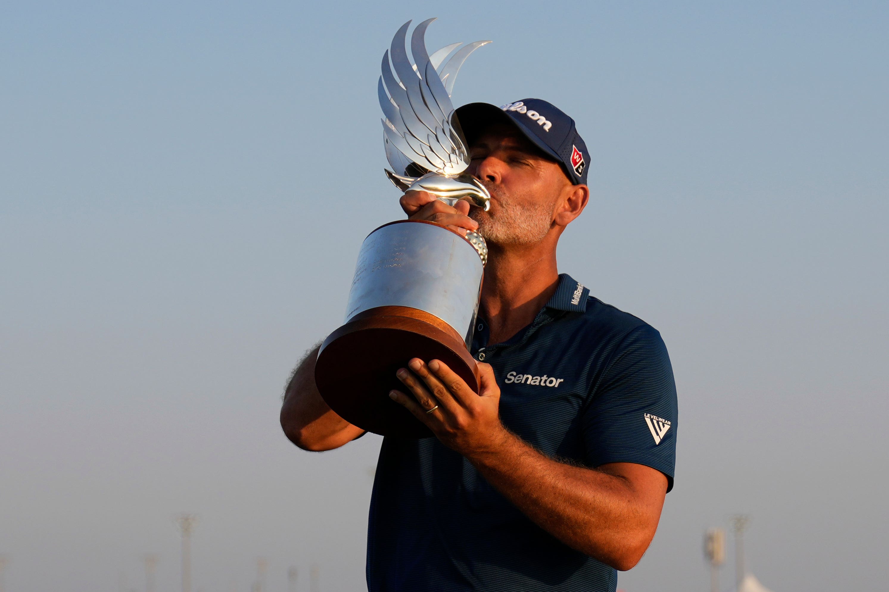 Paul Waring celebrated the biggest win of his career at the Abu Dhabi Golf Championship (Altaf Qadri/AP)