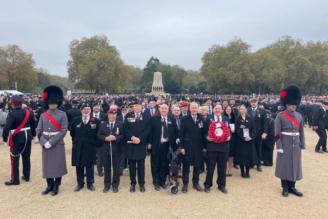 Michael Woods marched with other blind veterans and representatives from the charity Blind Veterans UK (Blind Veterans UK/PA)