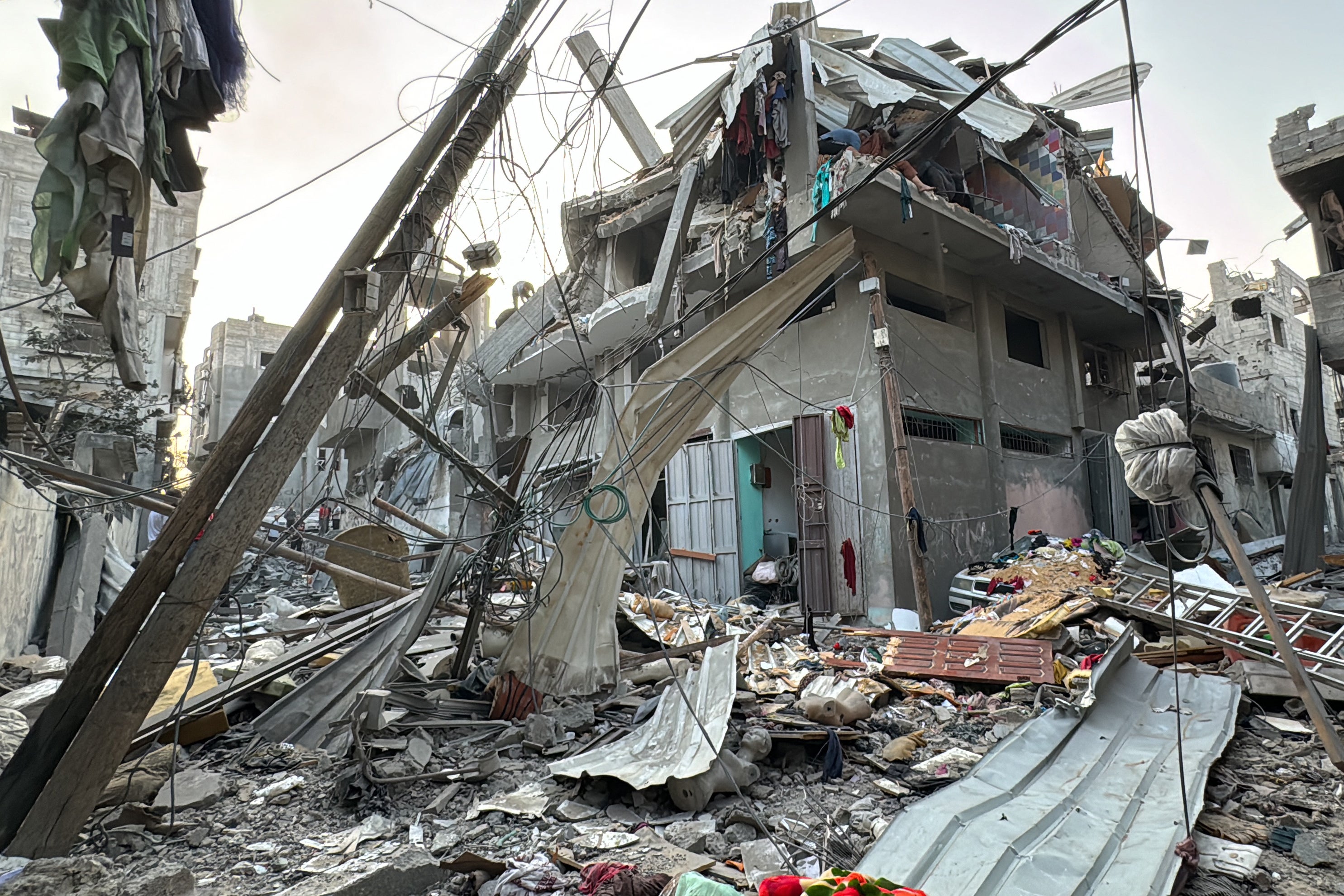 Rubble surrounds a home after it was hit in an Israeli strike on the Jabalia refugee camp in the northern Gaza Strip