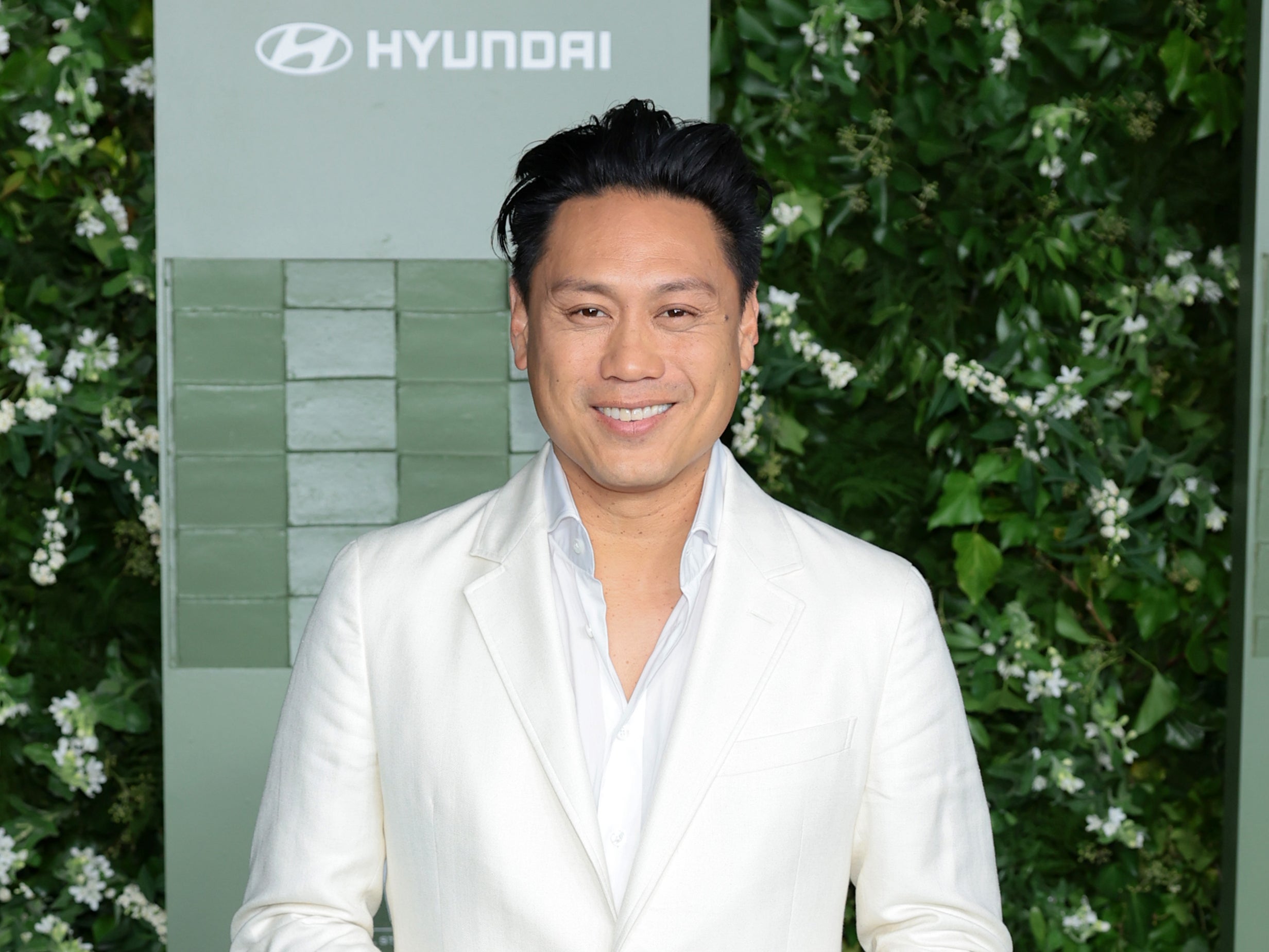 Wicked director Jon Chu joined the Los Angeles premiere from hospital