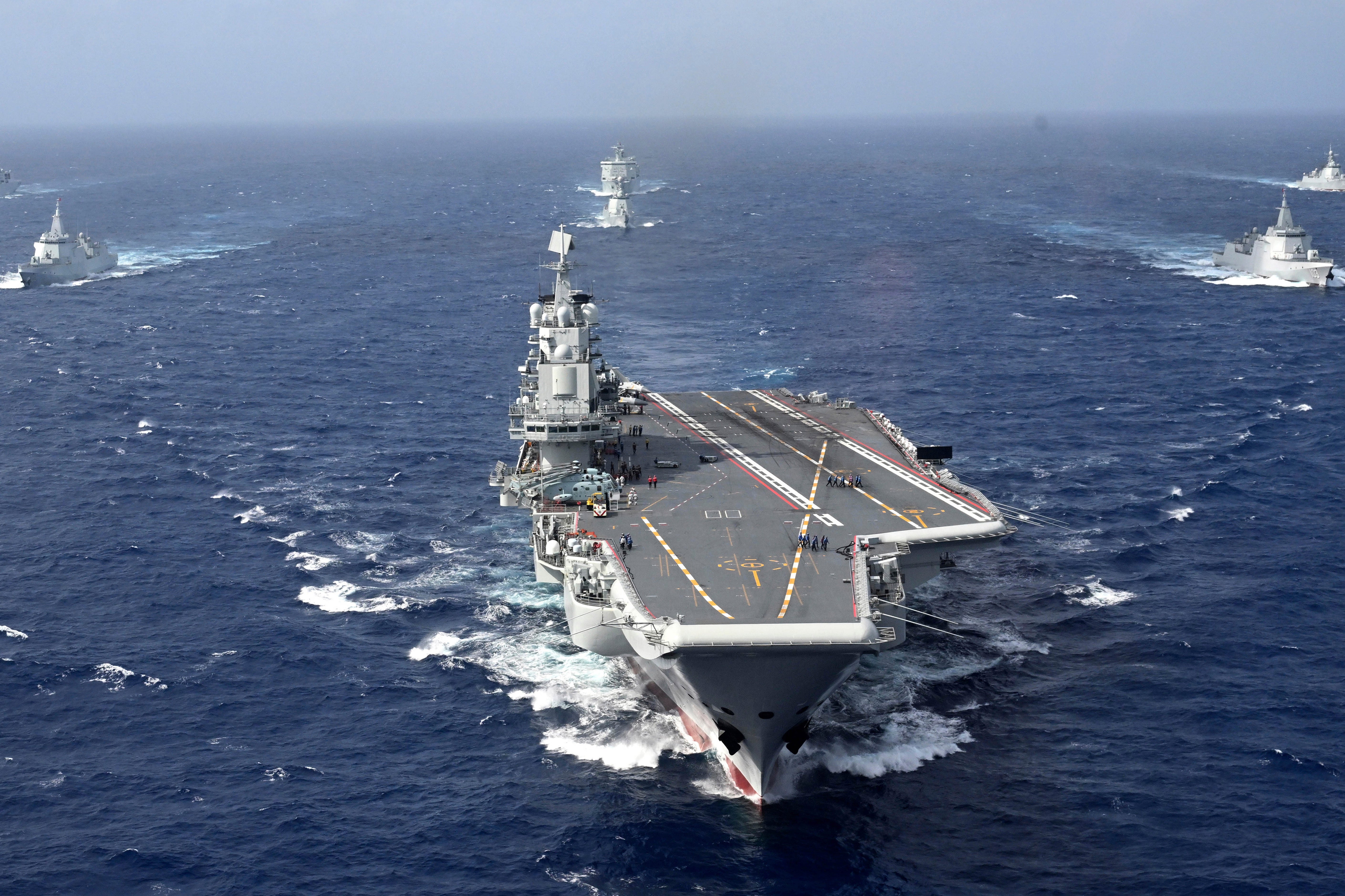 Chinese aircraft carrier Liaoning carries out a formation exercise with the Shandong carrier, unseen, for the first time in the South China Sea in October 2024