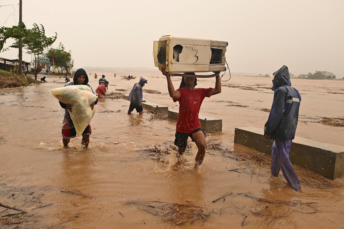 Typhoon batters stormweary Philippines and displaces…