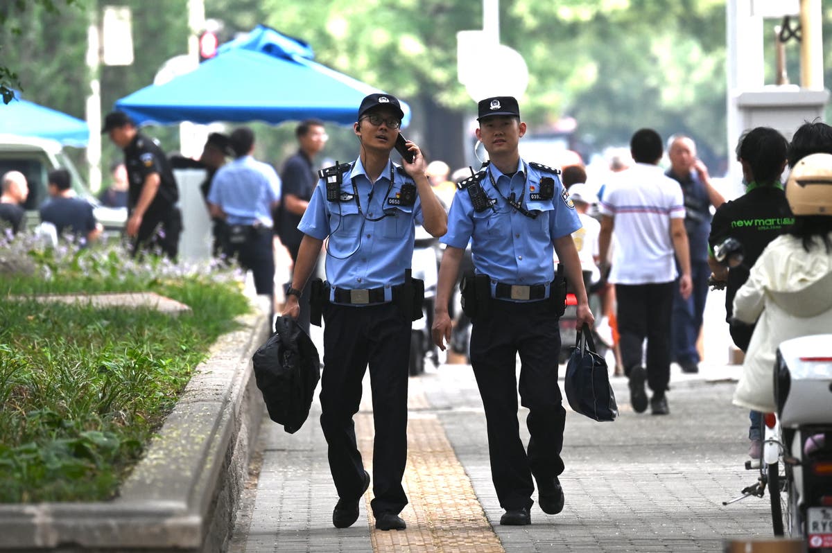 At least 35 killed and scores injured as car ploughs into pedestrians in Chinese city