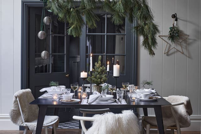 From nature-inspired accents to warm wood and cosy faux far – how to get the Scandi aesthetic (The White Company/PA)