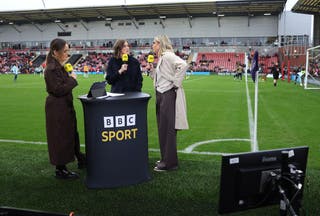 Kelly Somers (left) presents BBC coverage of Man Utd v Arsenal in the WSL