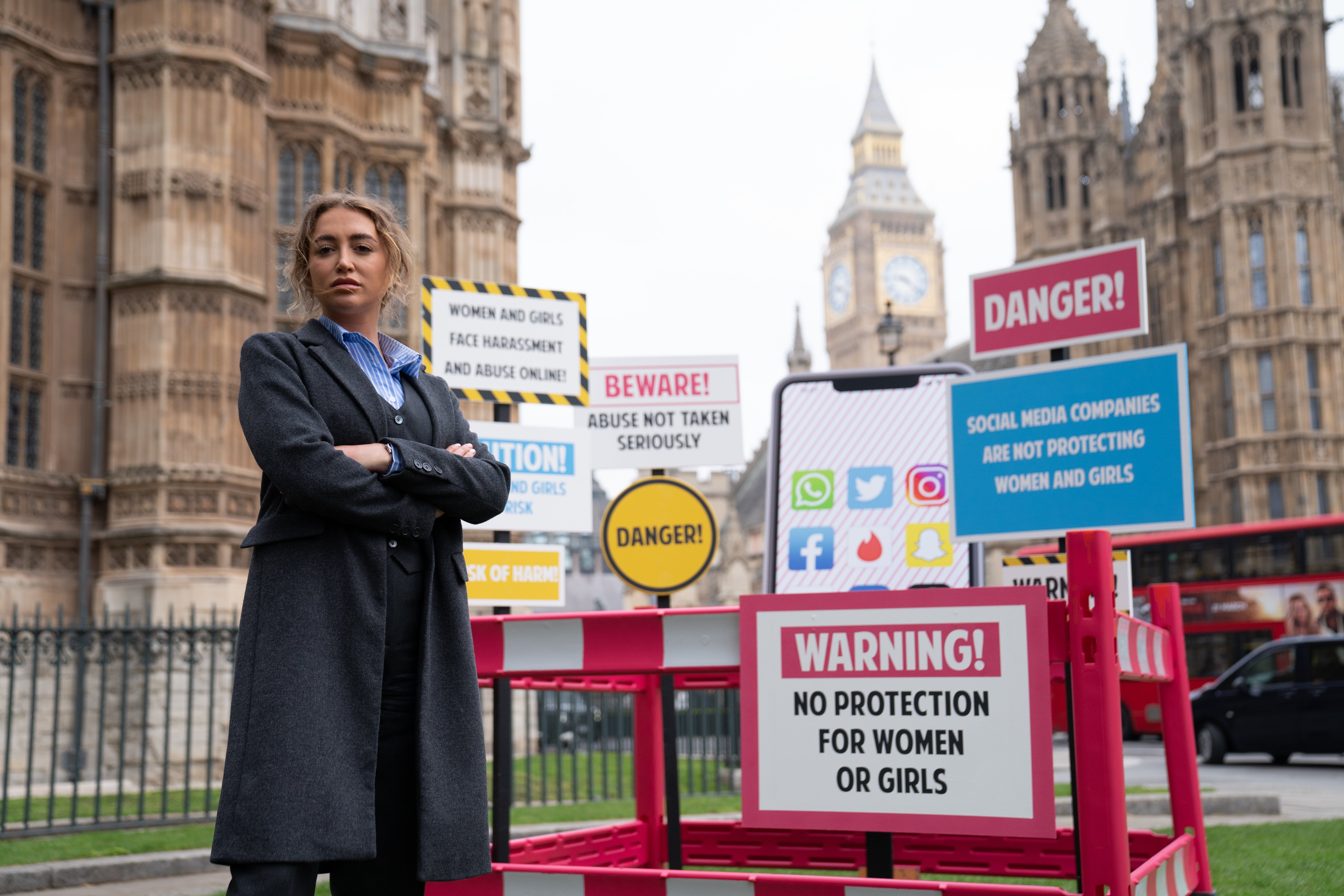 Georgia Harrison, who was a victim of revenge porn, at a demonstration organised by Refuge outside the Houses of Parliament, Westminster (Stefan Rousseau/PA)