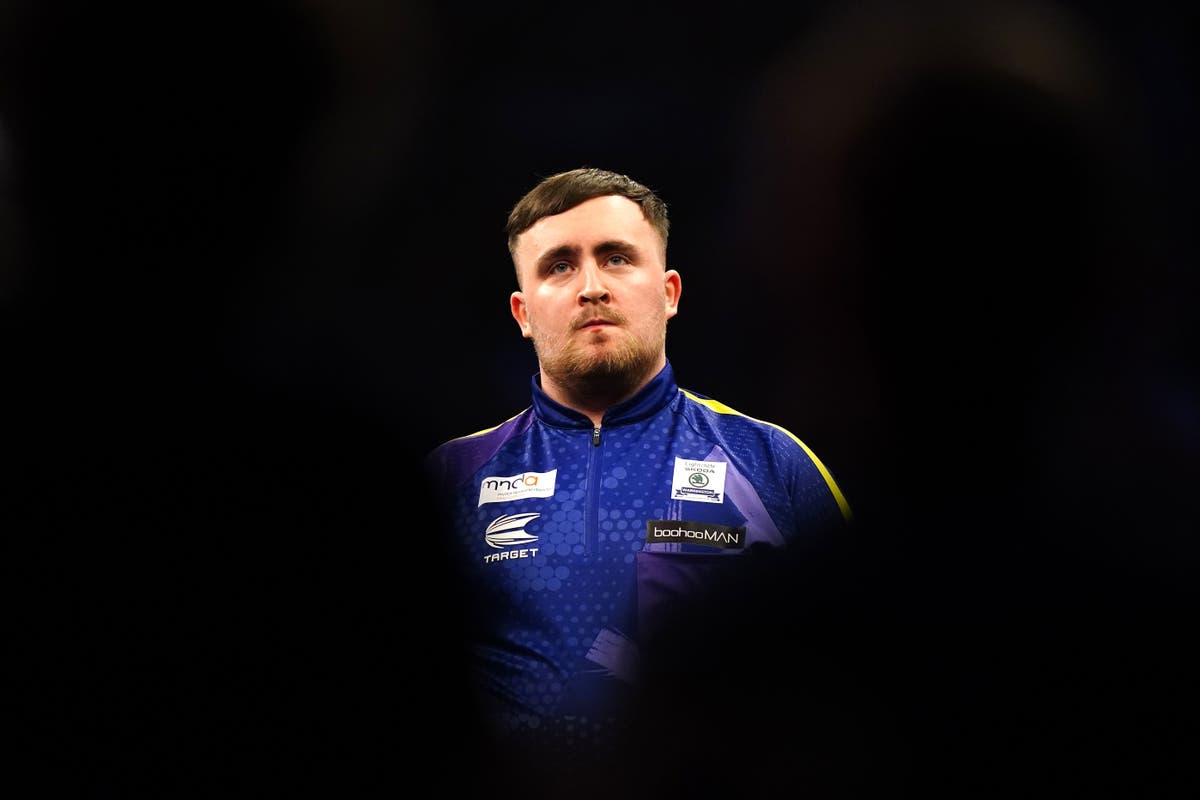 Luke Littler misses double for nine-dart finish but claims Grand Slam victory