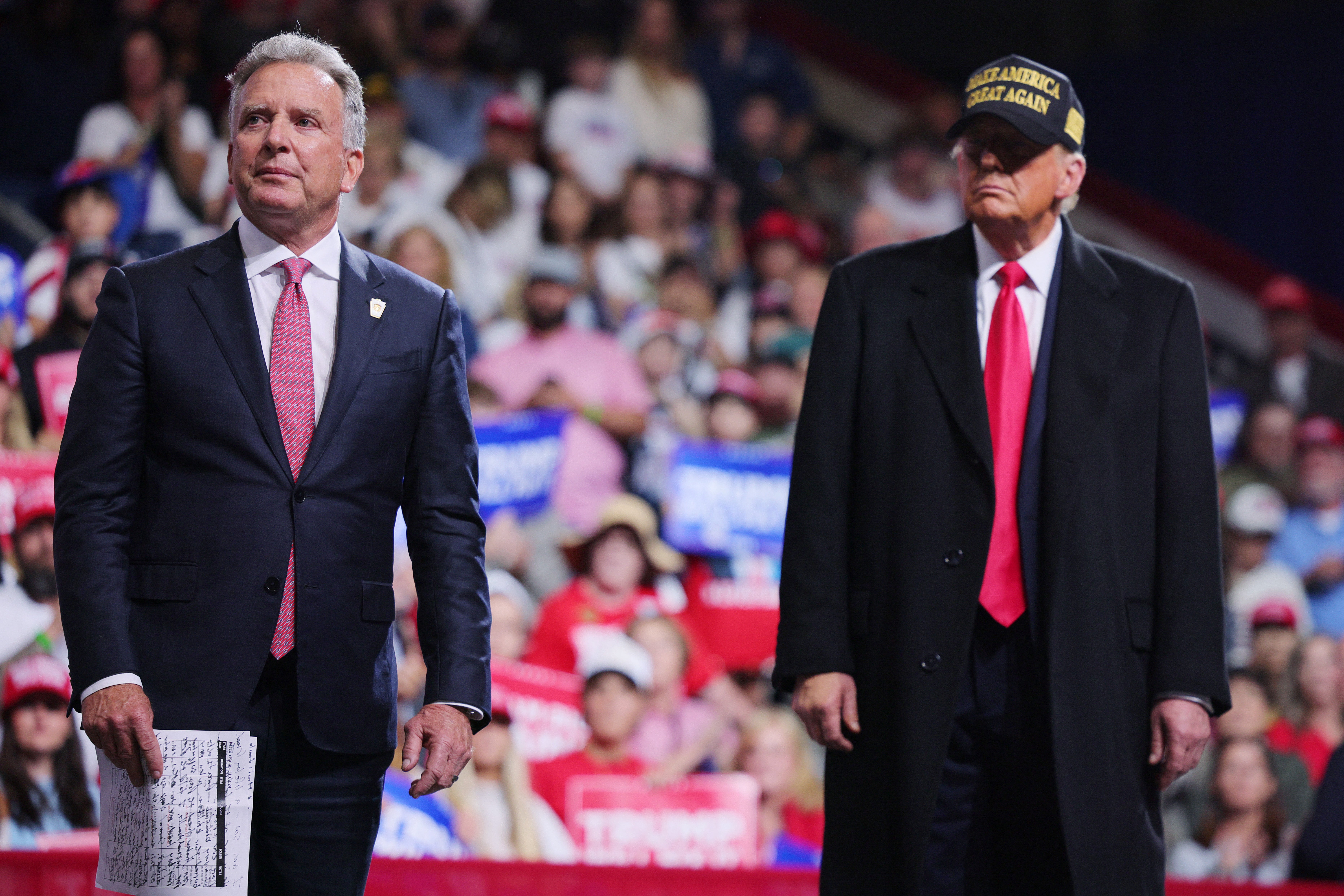 Businessman Steve Witkoff stands next to Donald Trump during a campaign rally in Macon, Georgia, on November 3.