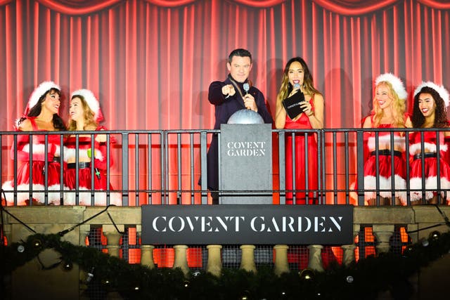 Luke Evans and Myleene Klass host the 2024 annual Christmas Lights Switch On for Save the Children in Covent Garden, London (Matt Crossick/PA)