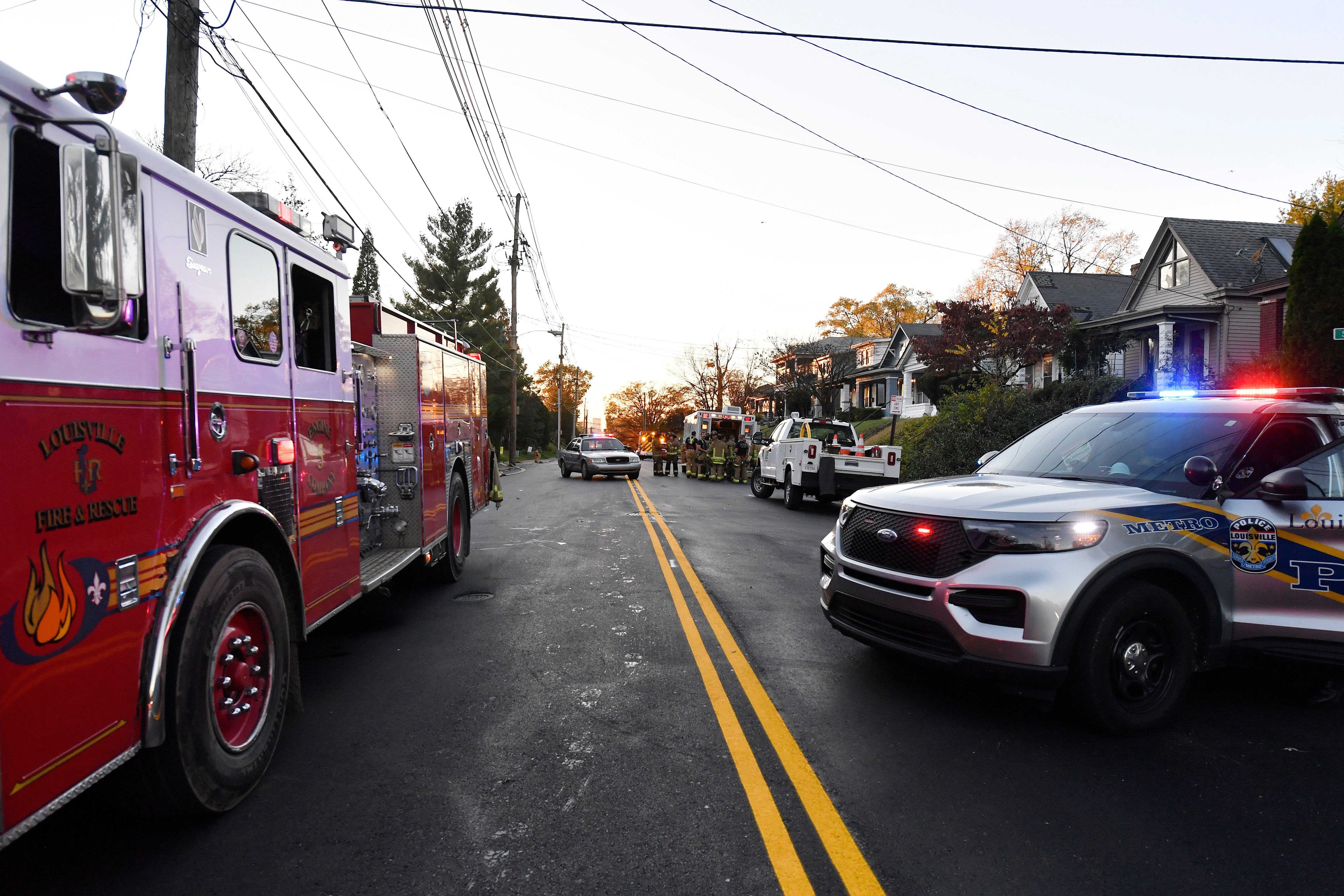 Emergency vehicles park near the site of an explosion in Louisville, Kentucky on Tuesday that injured at least 11 people