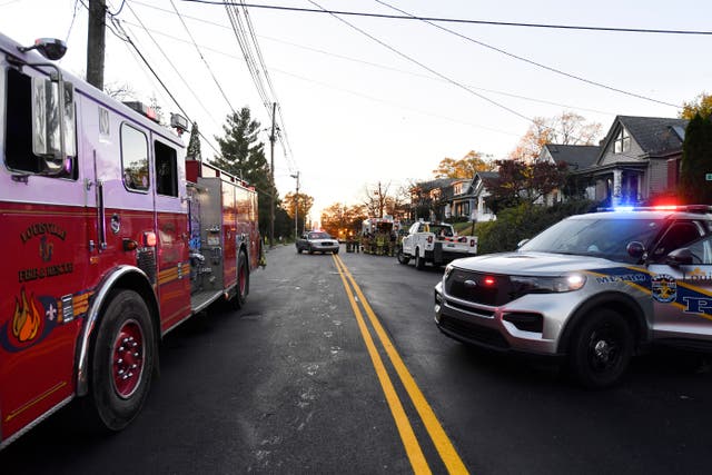 <p>Emergency vehicles park near the site of an explosion in Louisville, Kentucky on Tuesday that left two people dead </p>