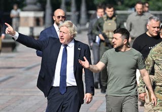 He accompanied Boris Johnson to meet Volodymyr Zelensky, right, in Kyiv in September 2023