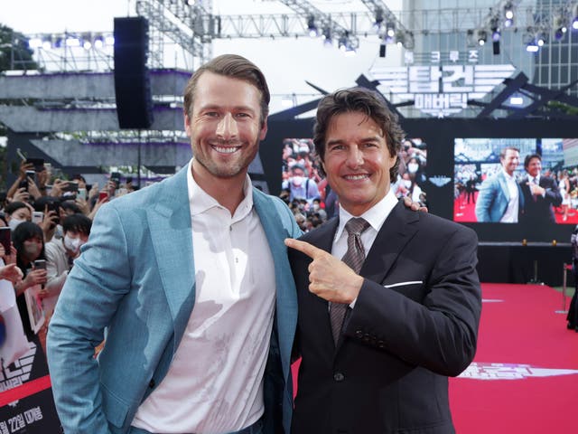 <p>Tom Cruise and Glen Powell at the Korea Red Carpet for Top Gun: Maverick in 2022</p>