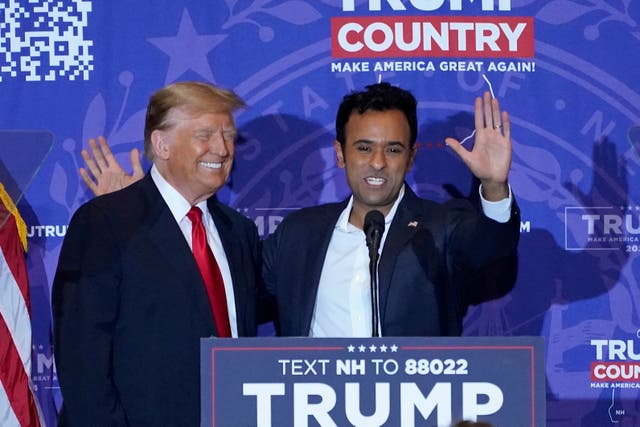 <p>US entrepreneur Vivek Ramaswamy endorses Republican presidential candidate former US President Donald Trump during a campaign event at the Atkinson Resort and Country Club in Atkinson, New Hampshire, on January 16, 2024</p>