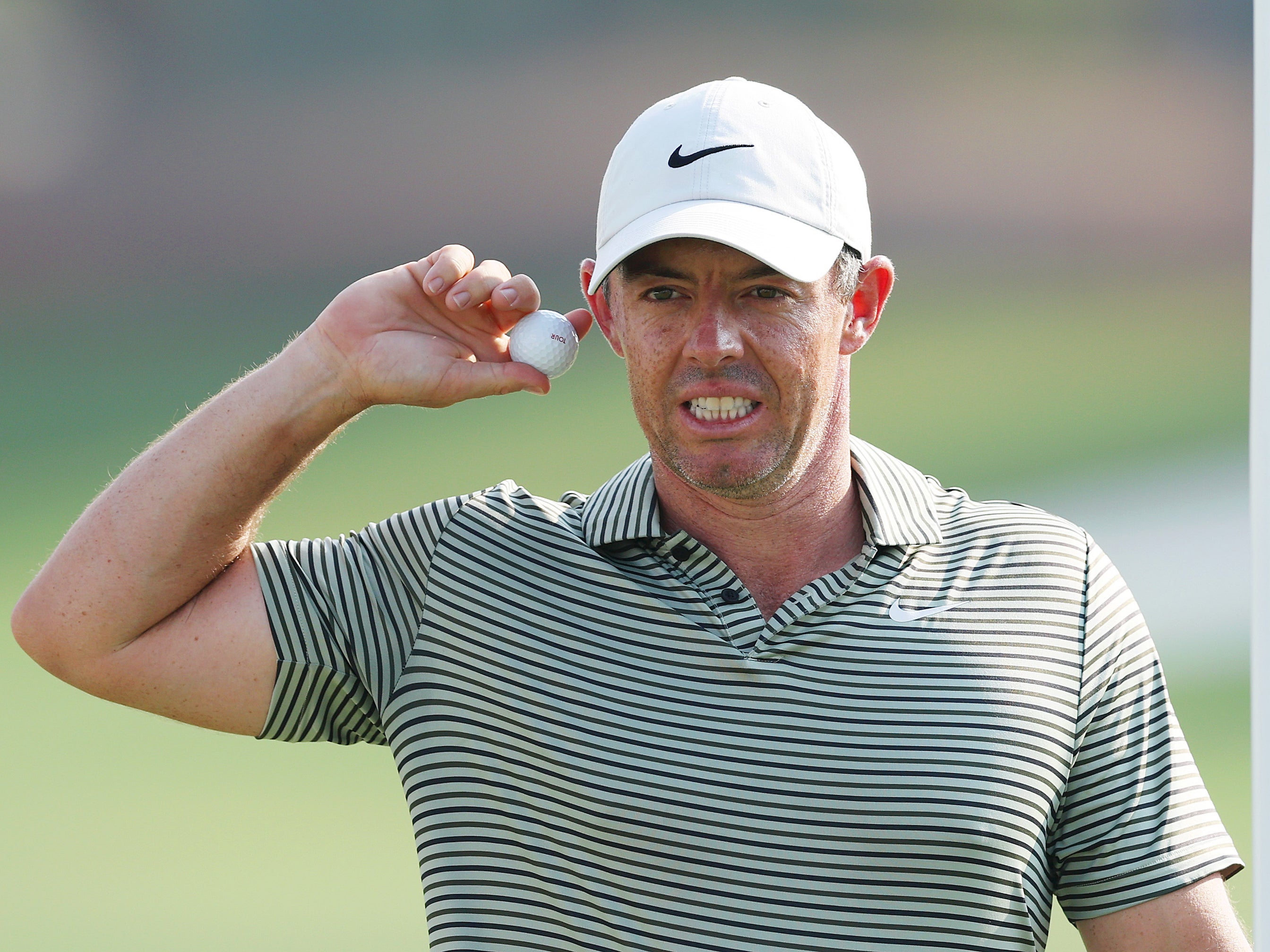 Rory McIlroy practicing on the Earth Course at Jumeirah Golf Estates