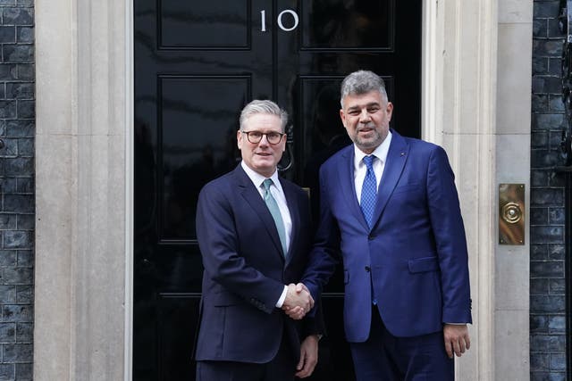 Sir Keir Starmer welcomes the prime minister of Romania, Marcel Ciolacu to Downing Street (Stefan Rousseau/PA)