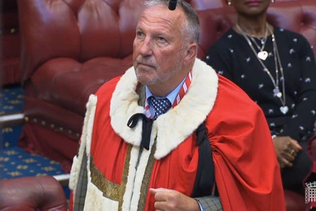 Former England cricketer Ian Botham takes up his seat in the House of Lords as Baron Botham of Ravensworth (House of Lords/PA)