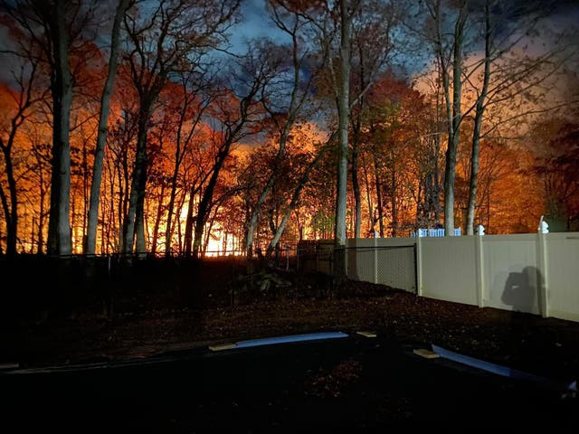 <p>A brush fire is seen on New York’s Long Island hamlet of Medford. A volunteer firefighter was arrested this week on suspicion of starting a fire. </p>