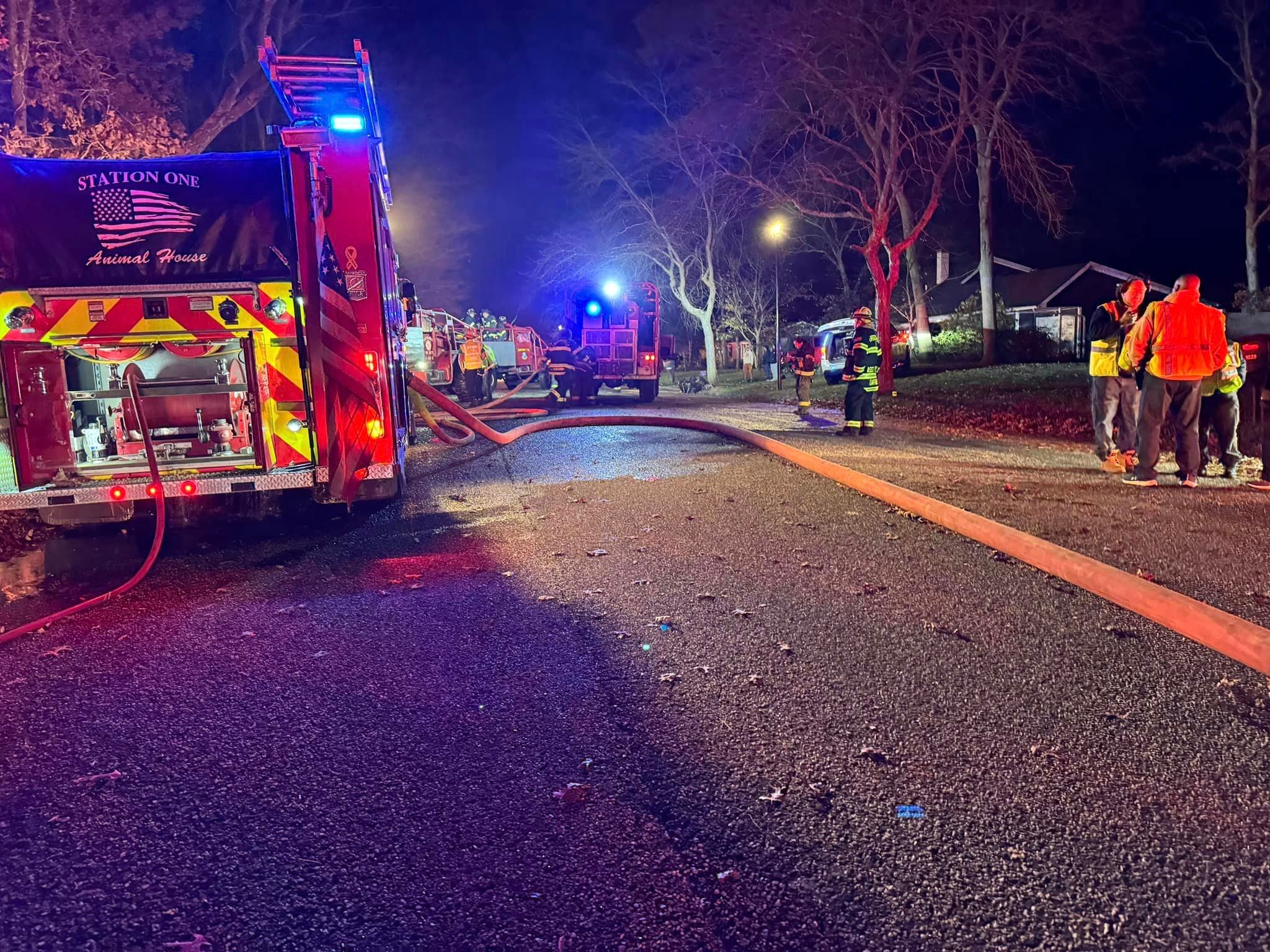 The Medford Fire Department responds to the scene of a brush fire in a residential area. Firefighters responded to multiple fires amid windy and dry conditions over the weekend.