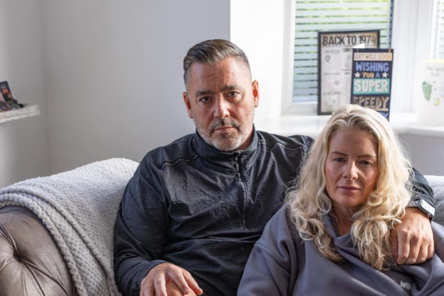 Accident victim Brian Whitnall with his partner Rachel Holmes at their home near Stansted in Kent. (RoSPA/Elizabeth Brown/PA)