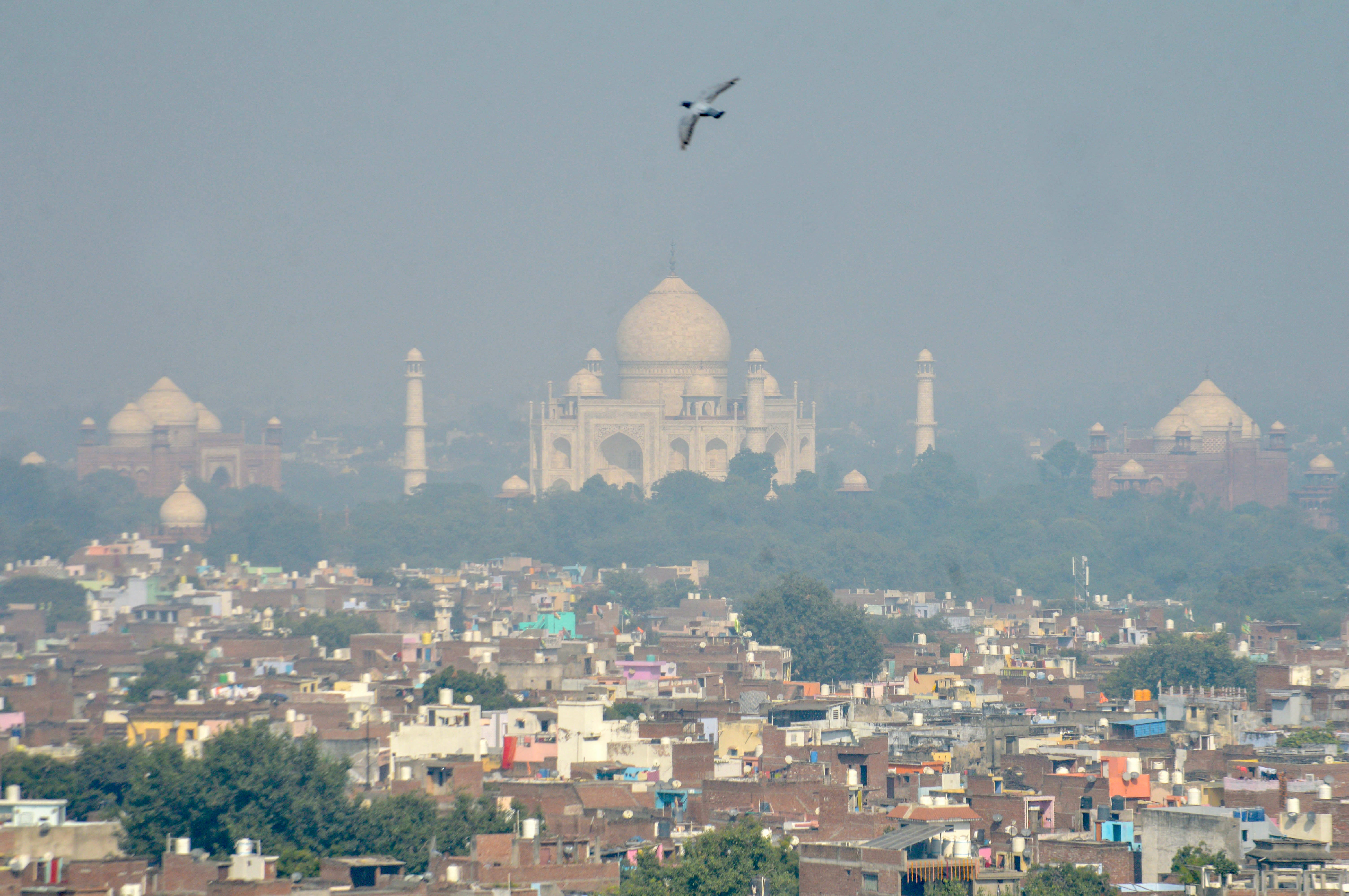 A general view shows the Taj Mahal amid smoggy conditions after Diwali in Agra on 1 November