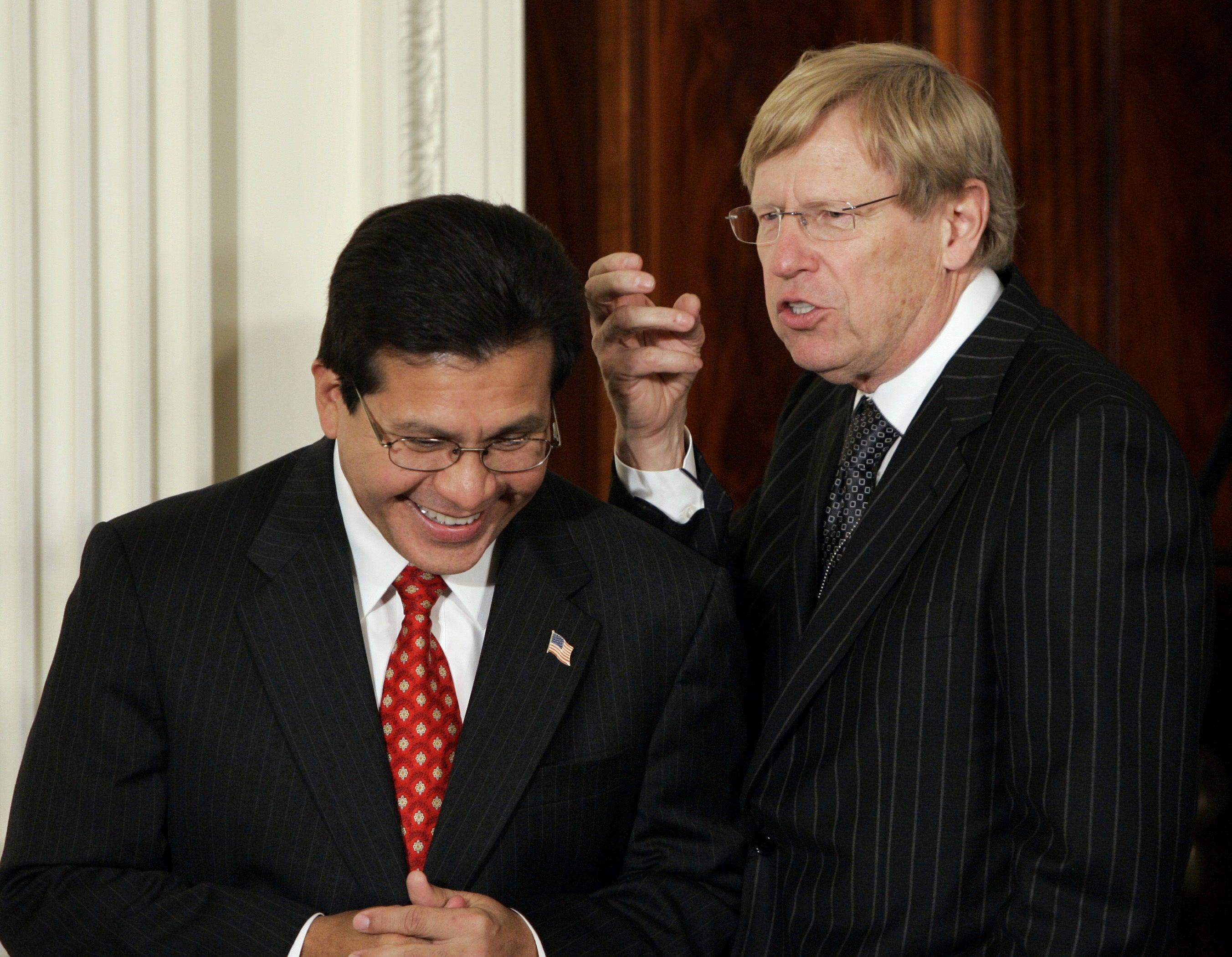 - Attorney General Alberto Gonzales, left, talks with former Solicitor General Ted Olson, before President Bush delivers a speech on terrorism in the East Room of the White House in Washington, Sept. 6, 2006