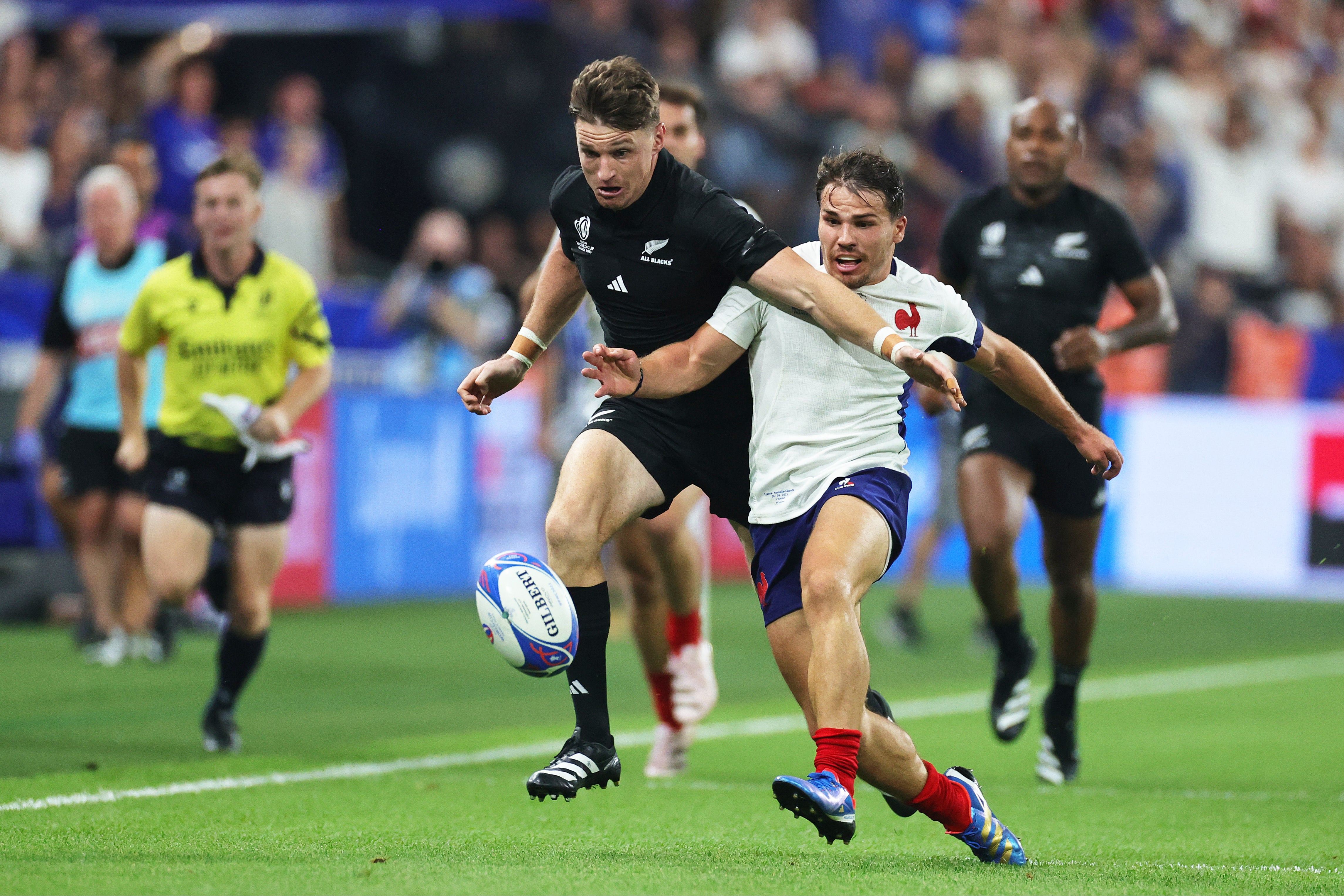 France’s Antoine Dupont, seen in action against the All Blacks’ Beauden Barrett during the 2023 Rugby World Cup, is still recovering from an ACL injury