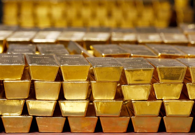 <p>File. Gold bars are stacked in a vault at the US Mint</p>