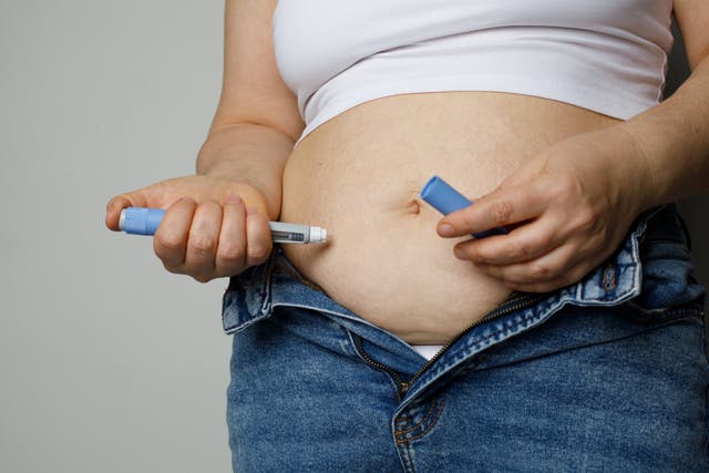 <p>Woman injecting Semaglutide Ozempic injection control blood sugar levels</p>