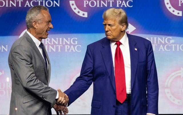 <p>Robert F. Kennedy Jr. shakes hands with Donald Trump in October 2024. Trump said he is nominating Kennedy to lead the Department of Health and Human Services </p>