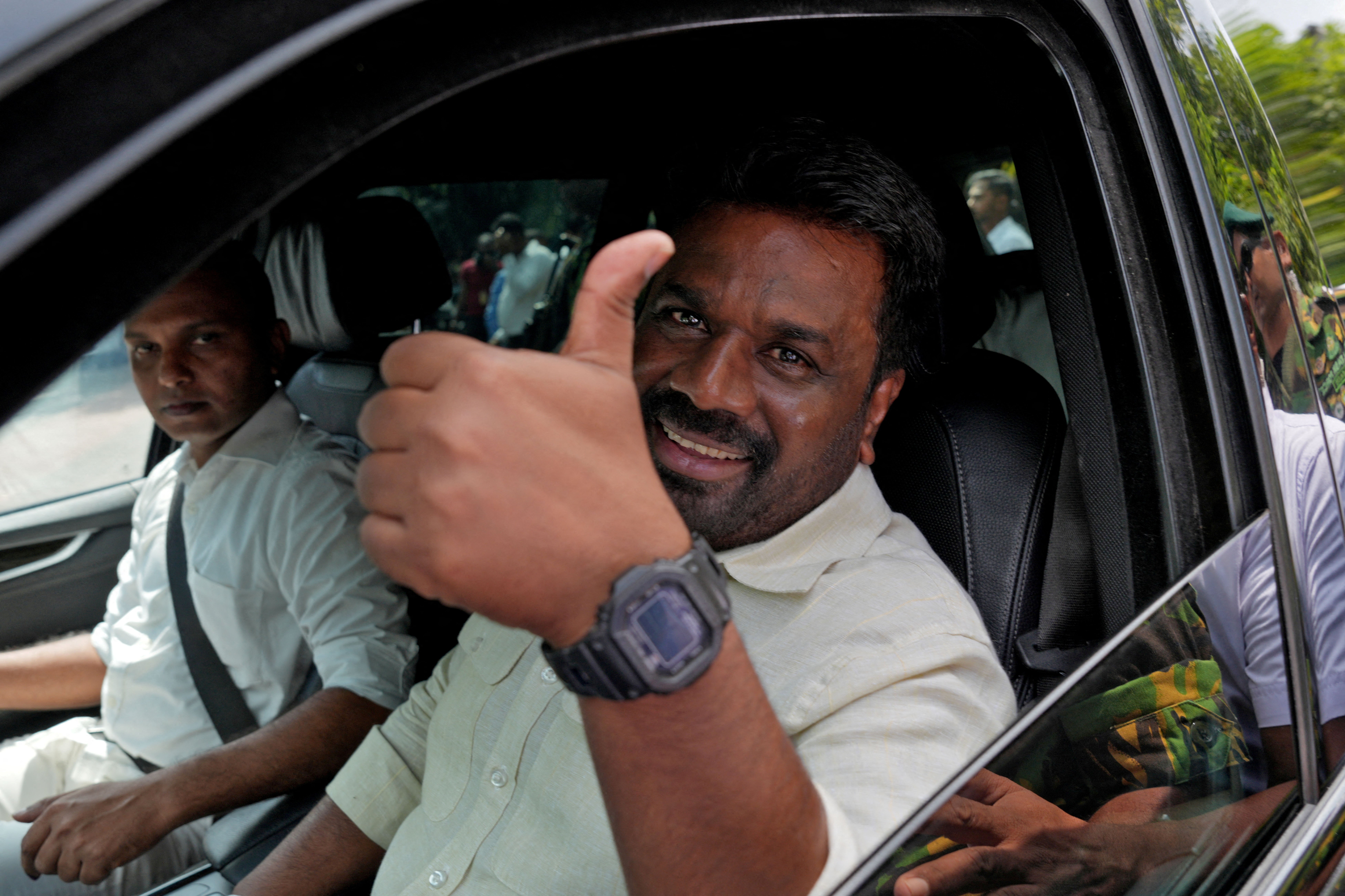 <p>Sri Lanka’s president and National People’s Power (NPP) party leader Anura Kumara Dissanayake gestures as he leaves after casting his vote</p>