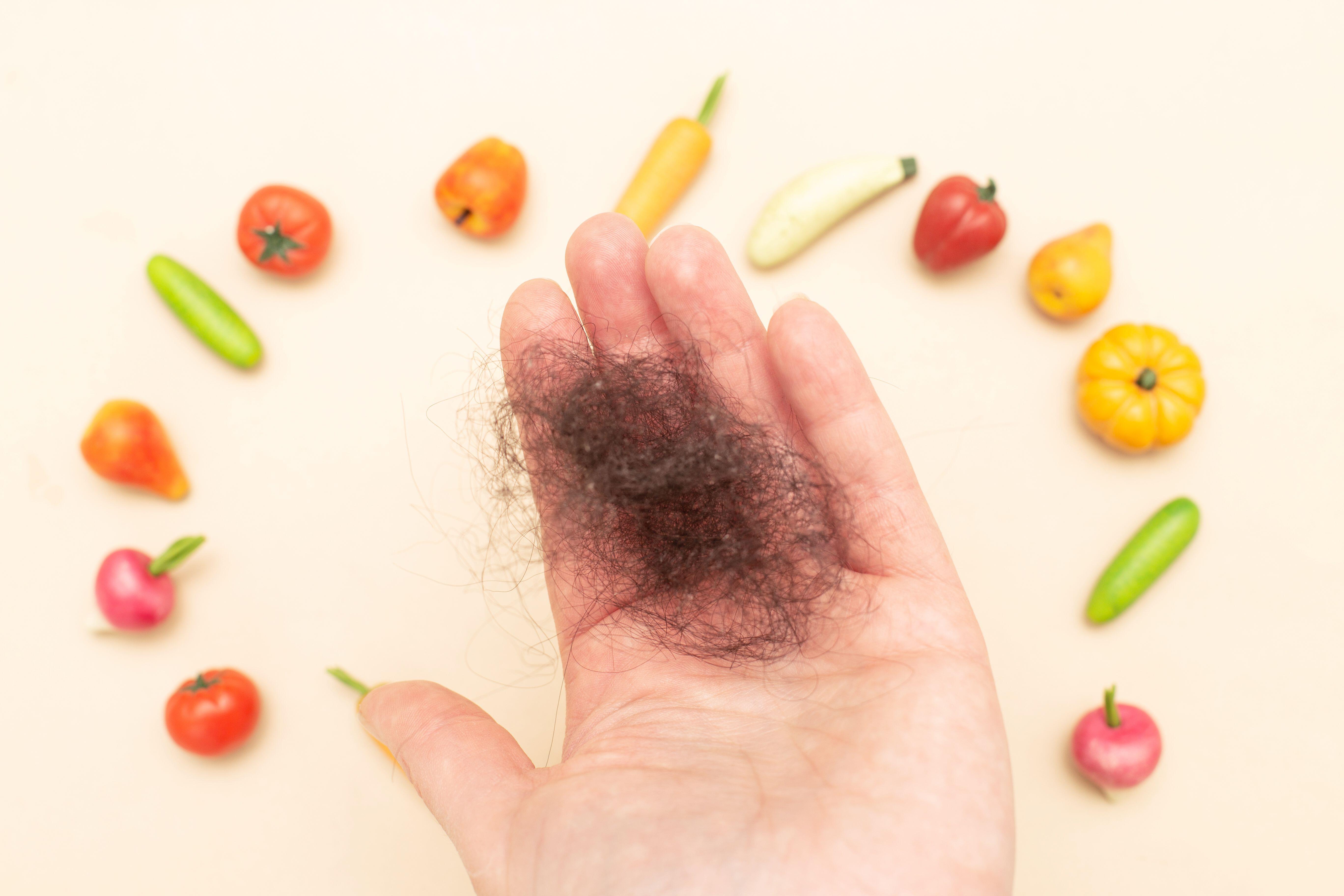 Diet, stress and illness can contribute to increased hair shedding (Alamy/PA)