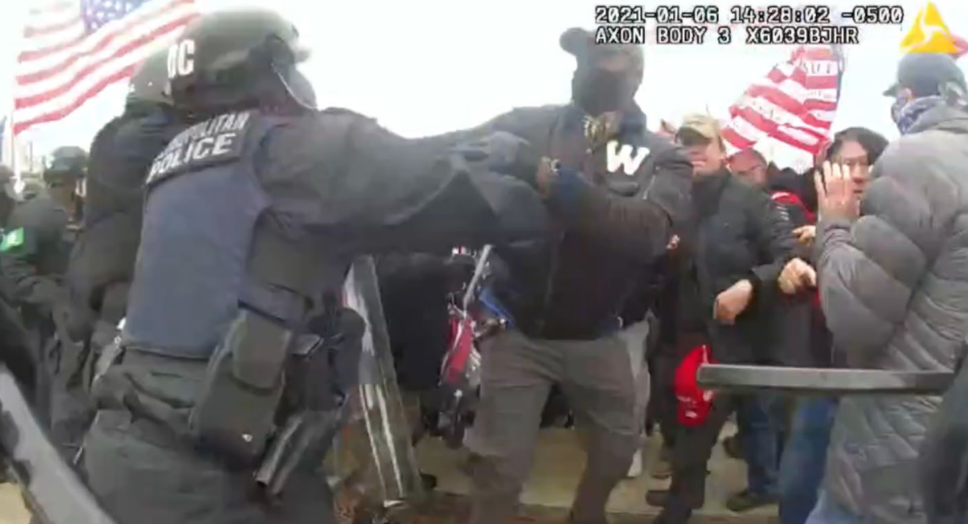 Man authorities say is Williams is seen confronting cops during the January 6, Capitol riots