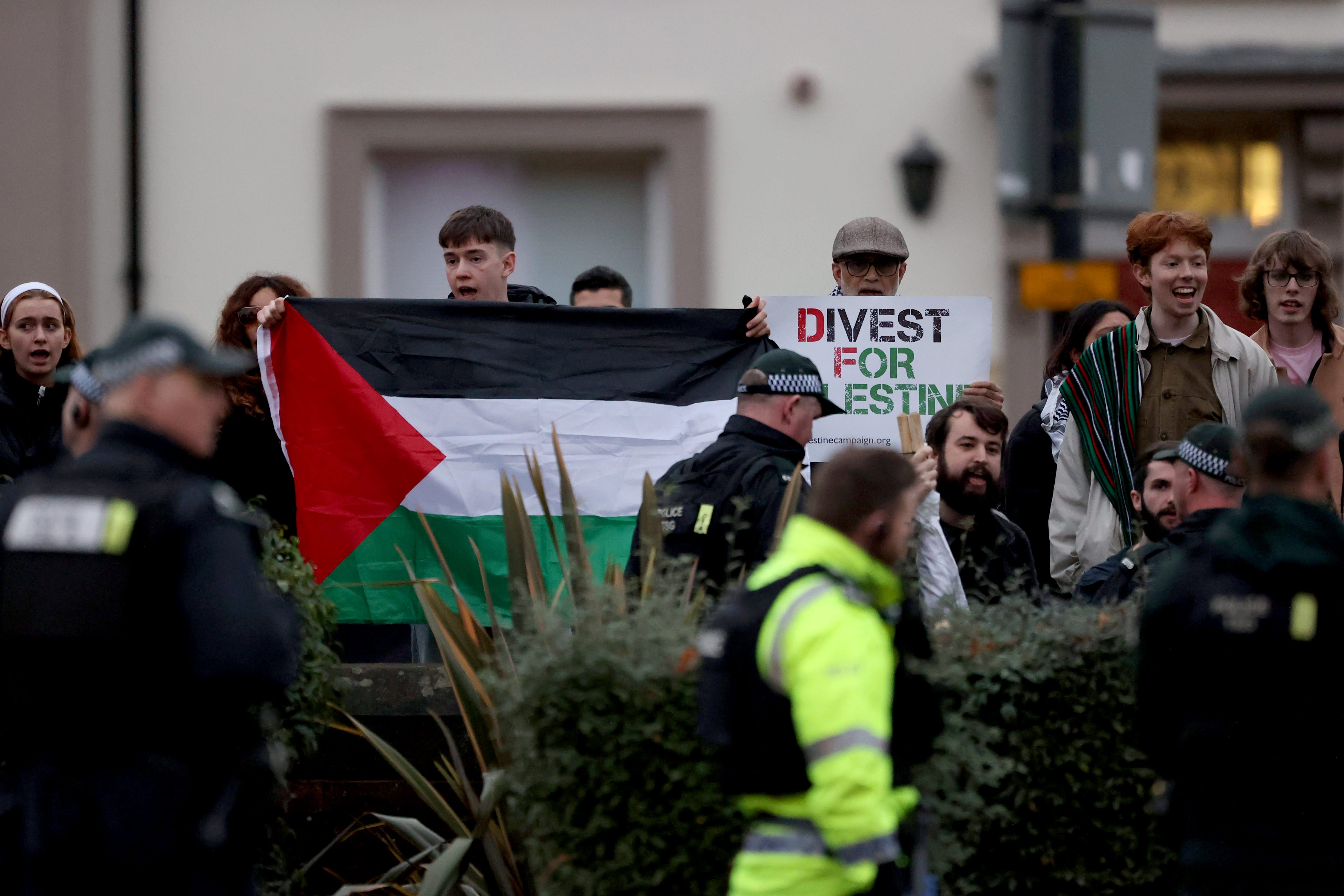 A protest outside Queen’s University during a visit by Hillary Clinton (Liam McBurney/PA)