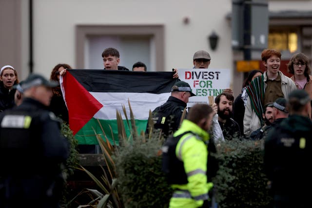 A protest outside Queen’s University during a visit by Hillary Clinton (Liam McBurney/PA)