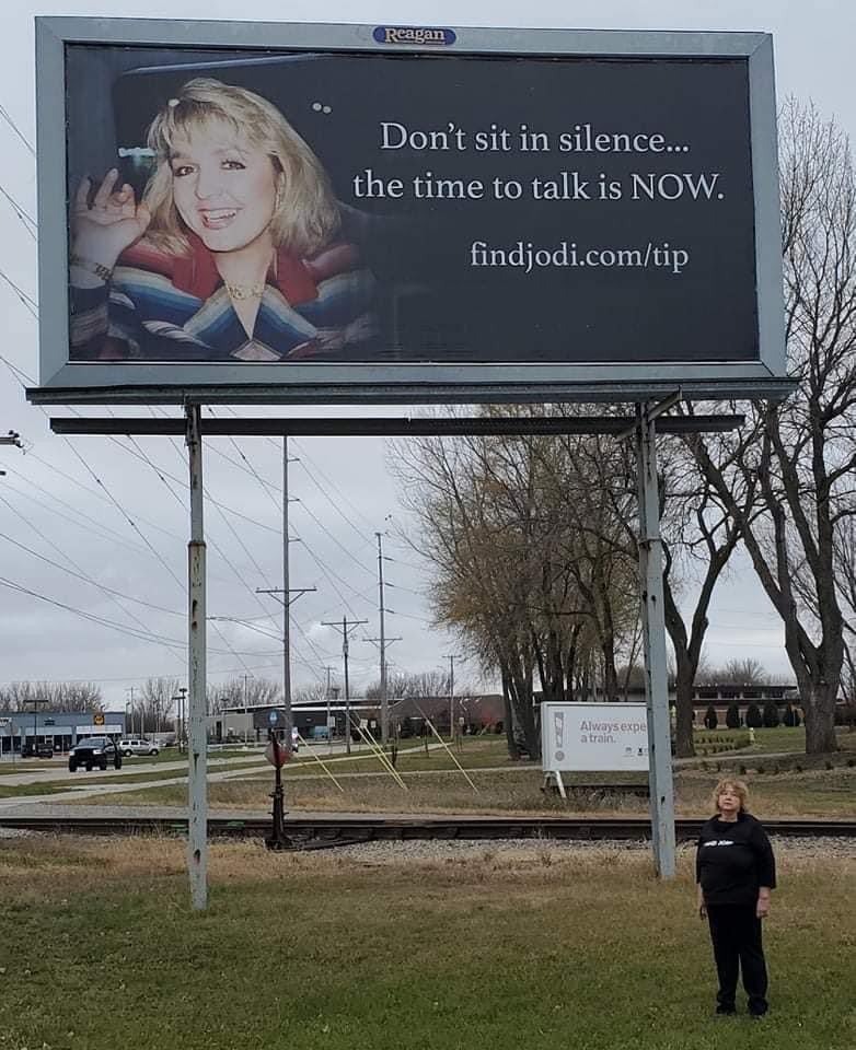 Caroline Lowe is in close contact with Jodi’s sister JoAnn Nathe (pictured) and keeps her updated on any developments. JoAnn is seen in front of a billboard in Mason City, Iowa