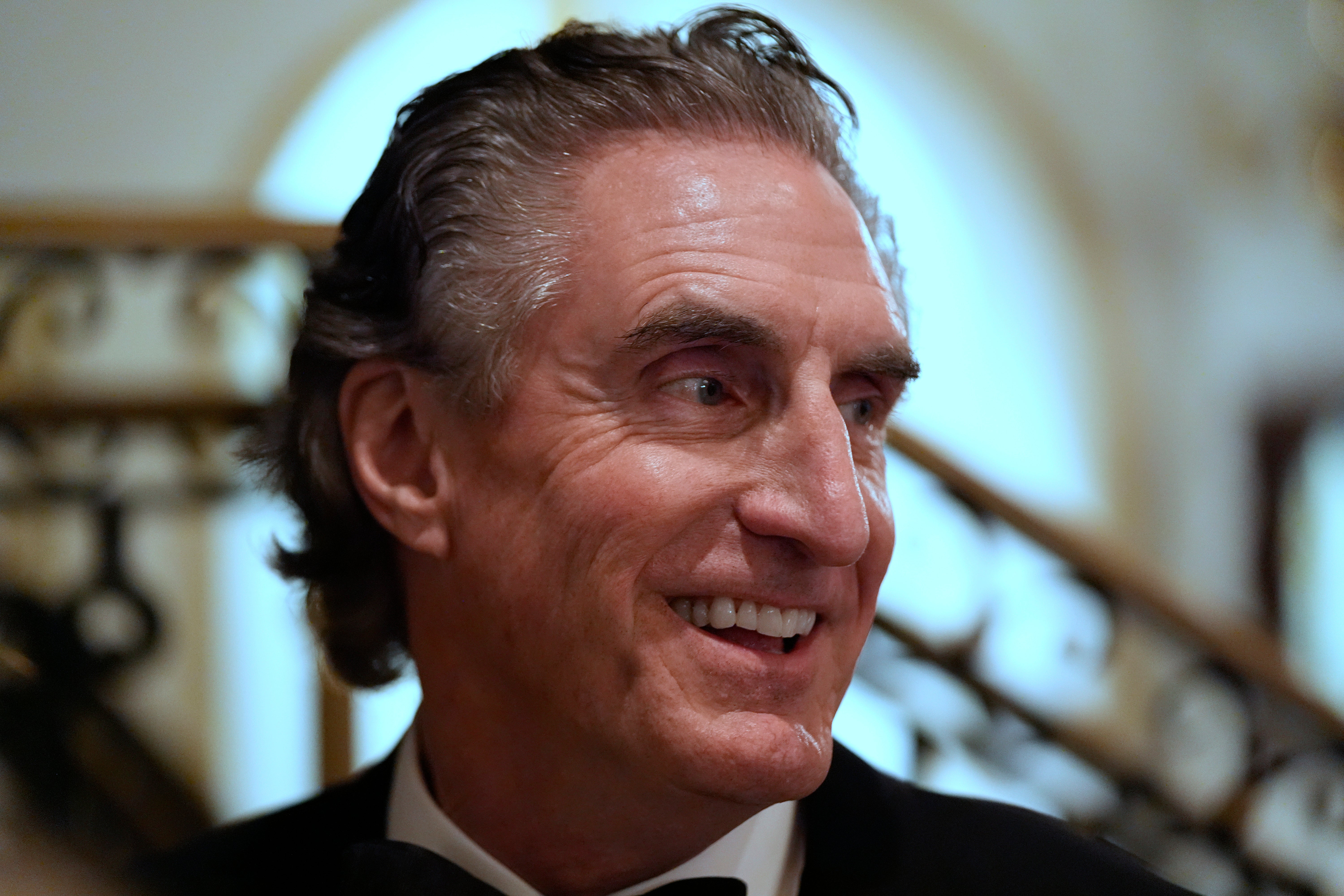 North Dakota Gov. Doug Burgum arrives before President-elect Donald Trump at an America First Policy Institute gala at his Mar-a-Lago estate, Thursday, Nov. 14, 2024, in Palm Beach, Fla.