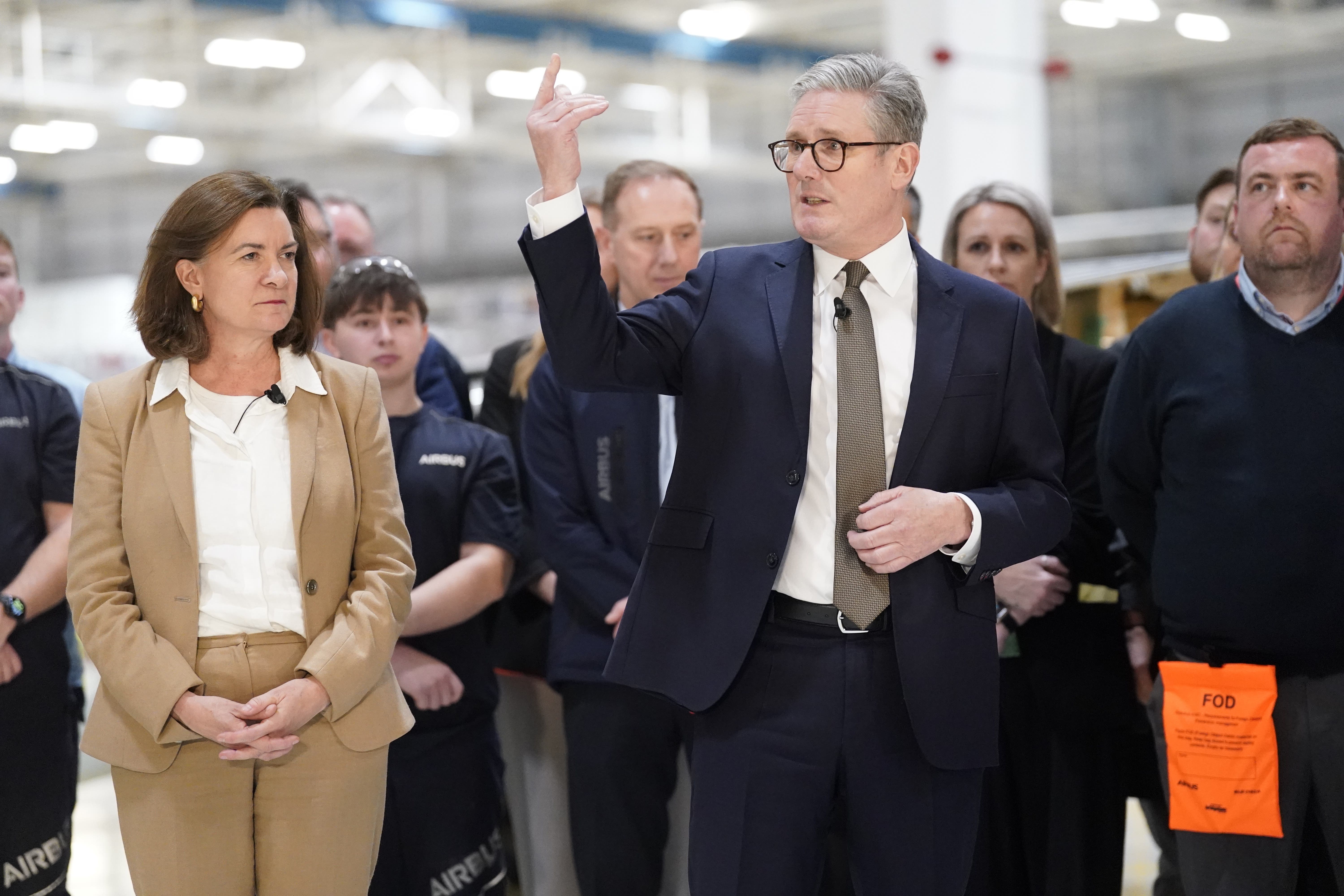 Prime Minister Sir Keir Starmer, with First Minister of Wales Eluned Morgan, addressing staff during a visit to Airbus in Broughton (Danny Lawson/PA)