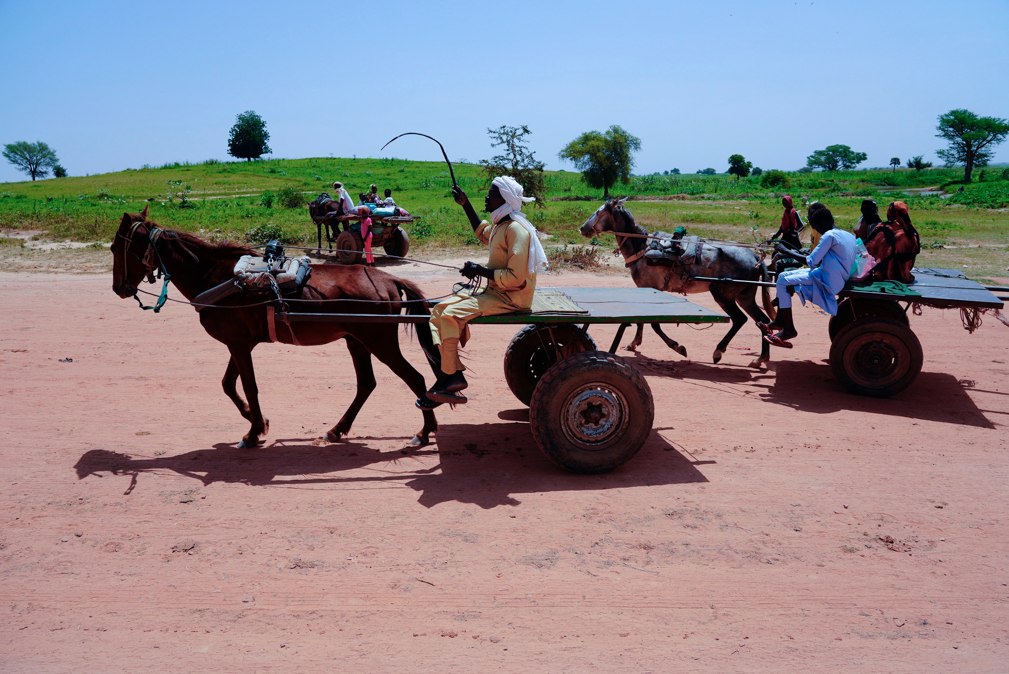 People cross into Chad from Sudan in Adre, Chad, Sunday, Oct. 6, 2024