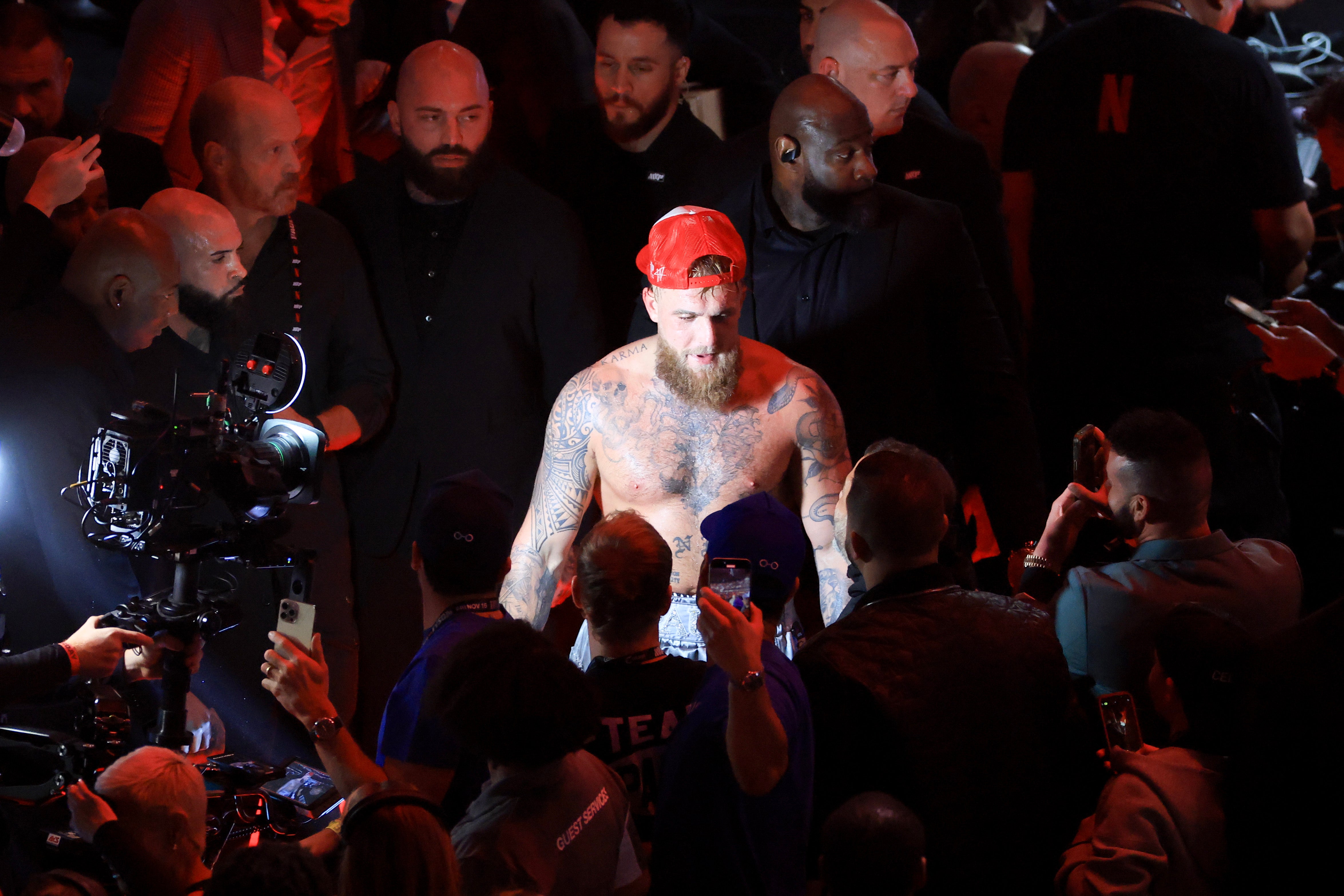 Jake Paul walks out of the ring after his unanimous-decision win