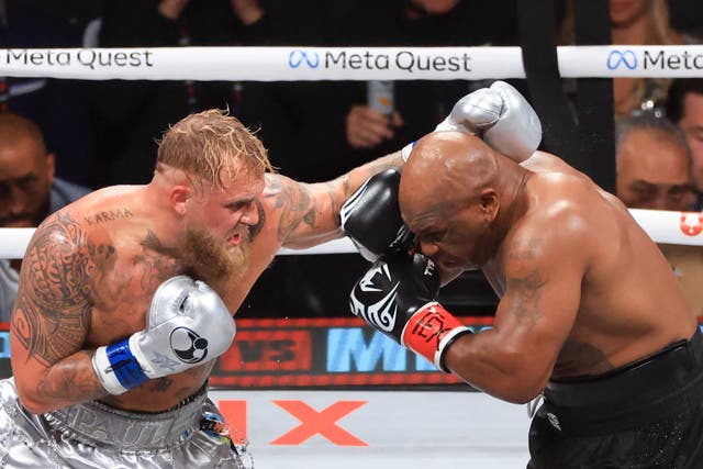 <p>Jake Paul (left) beat Mike Tyson on all three scorecards in Arlington, Texas </p>