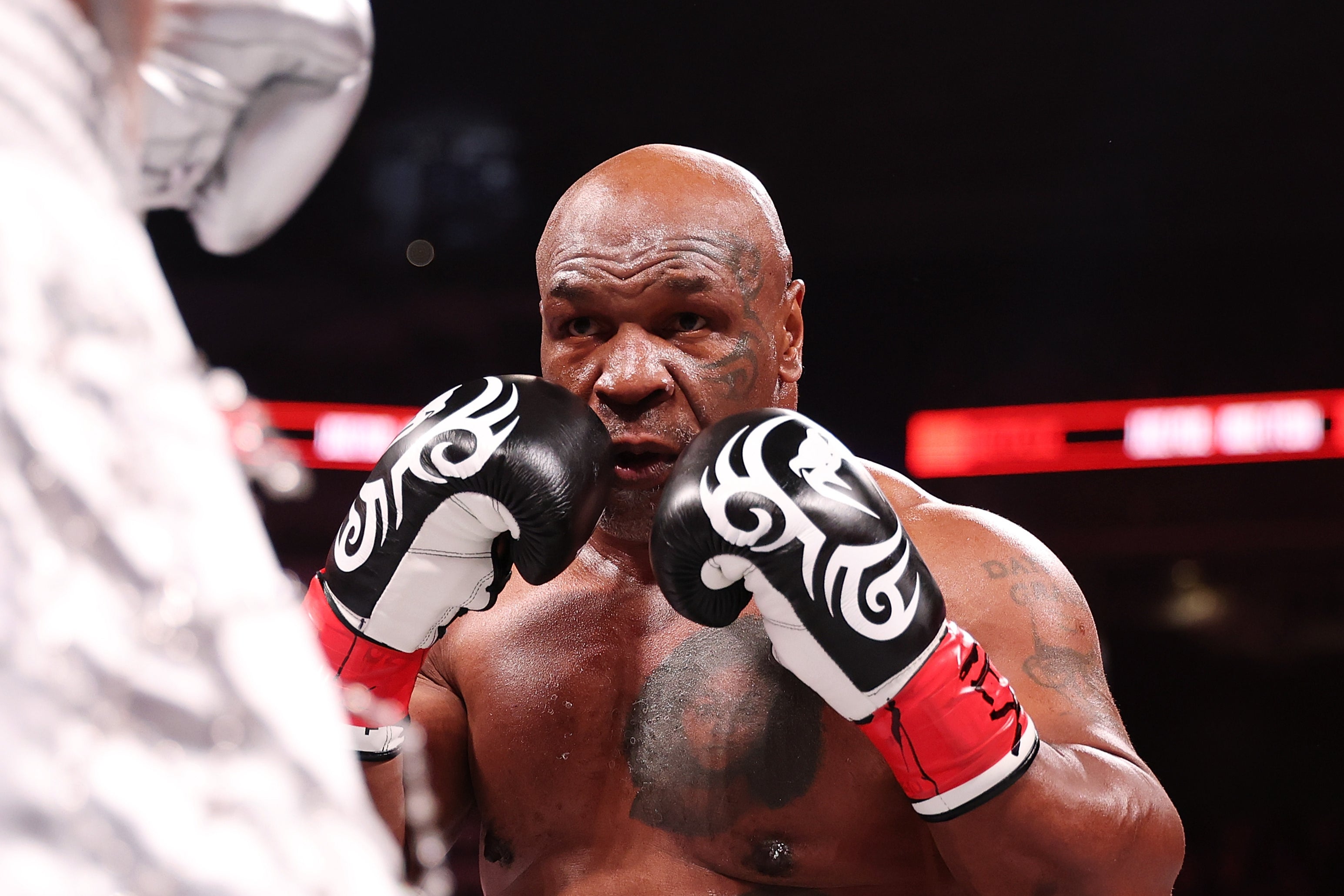 Mike Tyson explains why he kept biting his glove in Jake Paul defeat The Independent