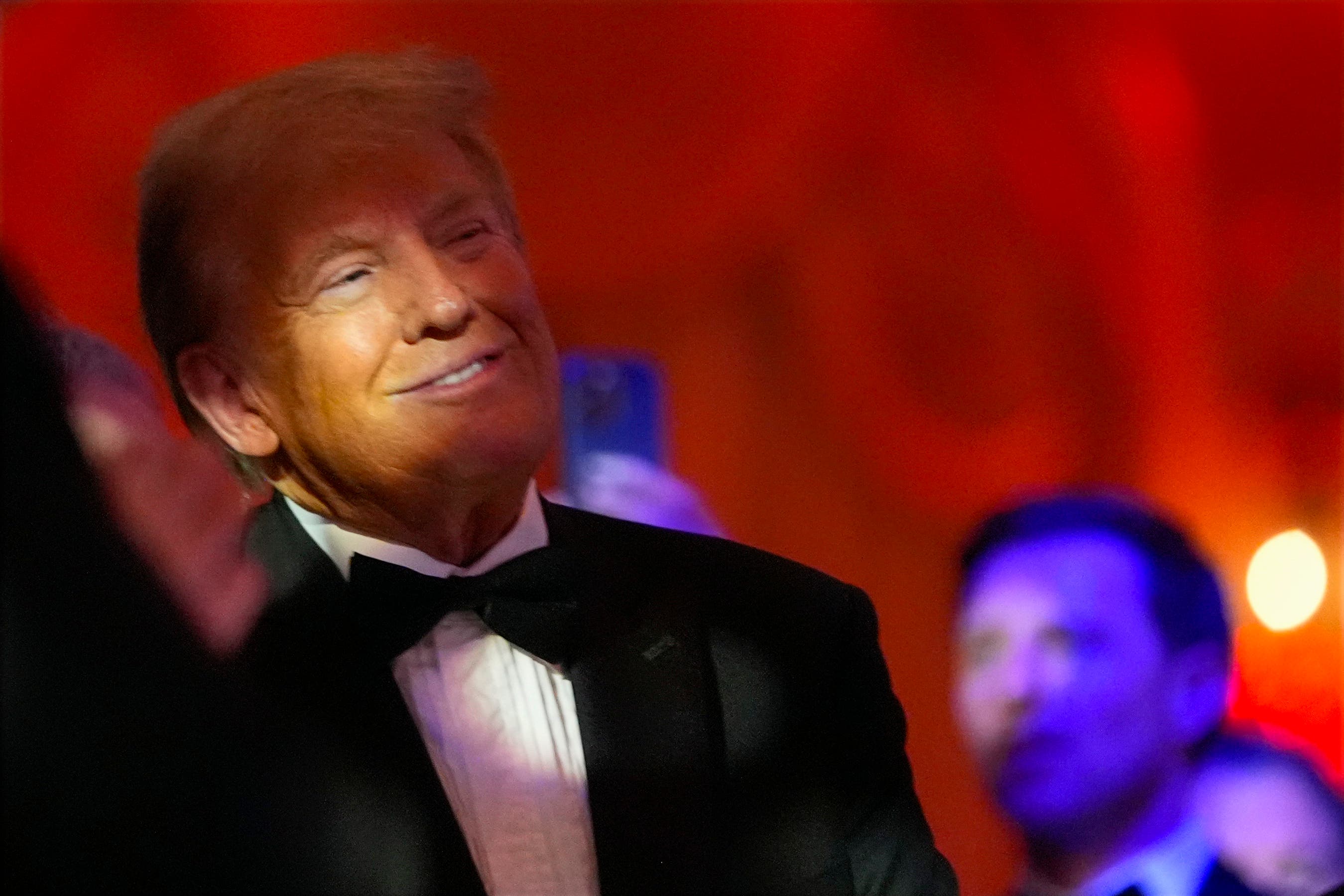 President-elect Donald Trump smiles during an America First Policy Institute gala at his Mar-a-Lago estate in Florida (Alex Brandon/AP)