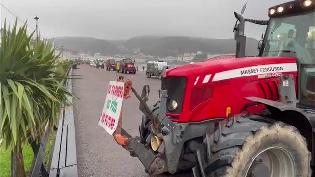 <p>Farmers protest against Labour tax increase with huge tractor convoy: ‘Starmer farmer harmer’.</p>