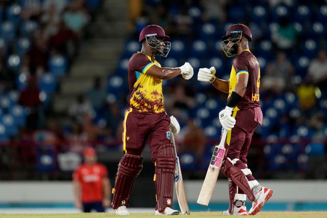 <p>Shai Hope, right, and Evin Lewis put England to the sword</p>